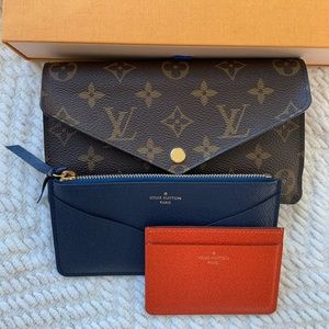Authentic Louis Vuitton Jeanne wallet with inserts.